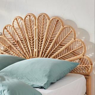 A collection of all natural bedding and homeware accessories for kids bedroom or playroom, featuring linen bedding, cotton cushions, wall art, rugs, lighting and décor accessories - available from Arkaim Home.