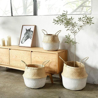 Two-tone handwoven seagrass storage basket in white and natural, ideal for boho or minimalist home organization and decor.