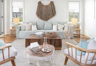 Coastal summer living room styled with natural materials — linen, rattan and jute home decor by Arkaim Home for a calm, airy summer interior.