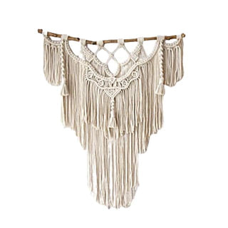 Handmade cotton macramé wall hanging with tassel details — natural boho wall art décor.