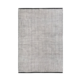 Hand-braided black and white jute and cotton rug. Sustainable, durable, and reversible—perfect for Japandi, Scandi, and modern interiors.
