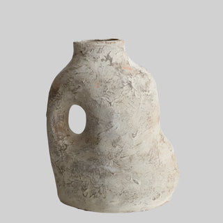 Nara handmade ceramic ornamental vase with an organic, asymmetrical shape and a textured clay finish with earthy undertones. The vase features a sculptural handle-like cutout and a rustic, wabi-sabi aesthetic. Perfect for Japandi, modern, and minimalist home décor.