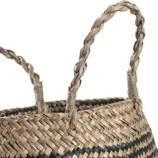 Handwoven natural and black seagrass storage basket with handles, perfect as a stylish hanging basket, pot planter, or decorative storage solution. This eco-friendly, two-tone basket with a tribal motif adds a boho touch to your home décor while keeping your space organized. Shop handcrafted storage baskets at our natural homeware store.