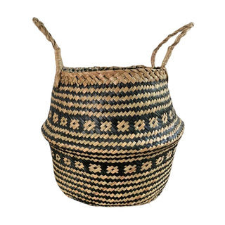 Handwoven natural and black seagrass storage basket with handles, perfect as a stylish hanging basket, pot planter, or decorative storage solution. This eco-friendly, two-tone basket with a tribal motif adds a boho touch to your home décor while keeping your space organized. Shop handcrafted storage baskets at our natural homeware store.
