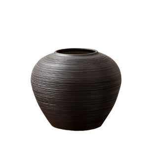 Black ribbed ceramic minimalist vase – a stylish decorative ornament perfect for modern and zen-inspired home decor. The Bo textured round vase adds an elegant touch to any space, ideal for coffee tables, shelves, or mantel displays. A must-have home accessory for a natural and contemporary aesthetic.