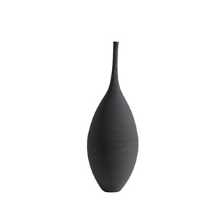 Ren Handmade Ceramic Vases in black and white, featuring sleek, elongated necks and organic, curved bases. These minimalist, sculptural vases are perfect for modern, Japandi, and wabi-sabi home décor, adding an elegant contrast with their monochrome design. Ideal for dried flowers or as standalone art pieces, crafted with fine ceramic texture for a luxurious, handmade finish. 