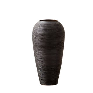 Black ribbed ceramic minimalist vase – a stylish decorative ornament perfect for modern and zen-inspired home decor. The Bo textured round vase adds an elegant touch to any space, ideal for coffee tables, shelves, or mantel displays. A must-have home accessory for a natural and contemporary aesthetic.