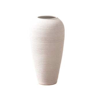 White ribbed ceramic minimalist vase – a stylish decorative ornament perfect for modern and zen-inspired home decor. The Bo textured round vase adds an elegant touch to any space, ideal for coffee tables, shelves, or mantel displays. A must-have home accessory for a natural and contemporary aesthetic.