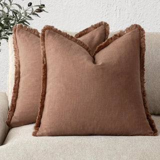 Terracotta fringed cotton cushion covers, made from 100% natural cotton for a soft and breathable feel. Featuring elegant ruffled edges, these timeless cushion covers are available in two sizes for flexible styling in any home décor.