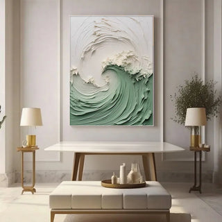 Abstract ocean wave painting in green and white, featuring sculptural 3D impasto texture on canvas in a modern interior setting.
