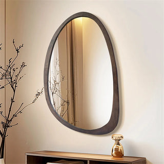 Modern wall mirror reflecting soft natural light