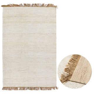 Close-up of beige jute cotton rug texture and soft fringe Arkaim Home
