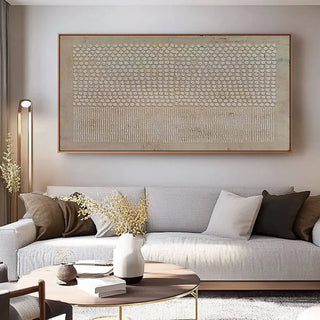 Minimalist beige panoramic abstract wall art styled above sofa in modern living room.
