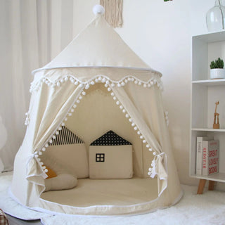 Beige children’s play tent styled with cushions for reading nook.