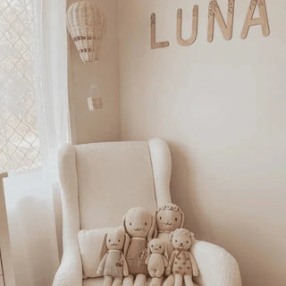 Rattan hot air balloon with a classic design, featuring a round balloon body and a small wicker basket beneath it. Perfect for boho and scandi nursery or playroom.