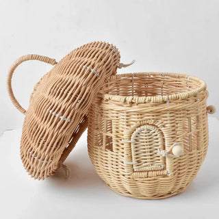 Handwoven rattan mushroom-shaped basket with arched door and handle, designed for children's toy storage and whimsical nursery decor.