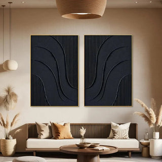 Set of two abstract geometric canvas prints featuring sculptural black wave patterns and textured linear details — ideal for modern minimalist and organic-inspired interiors.