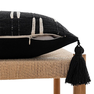 Ayat Linen Blend Cushion Cover – decorative black and white boho cushion with tasselled corners. Made from a soft linen-cotton blend, featuring an ethnic-inspired pattern for a natural home décor touch.