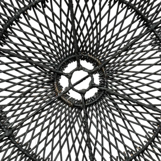 Endah Black Handwoven Rattan Pendant Lampshade – interwoven in a creative, organic shape, this ceiling light  is a statement piece, perfect for natural home decoration. This hanging lamp comlements boho, Scandi, and Wabi-Sabi aesthetics, adding warmth and texture to any space. Ideal for eco-conscious interiors.