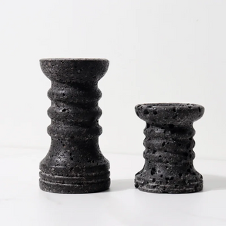 Handmade black marble candle holders, embracing the imperfect beauty of wabi-sabi. These elegant, durable candle holders add timeless charm to any space, perfect for desks, shelves, or mantels. This set of 2 offers versatile, symmetrical décor for a stylish, natural home accent.