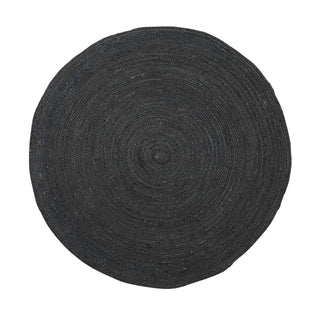 Round black jute rug handwoven with natural braided fibres—minimalist, sustainable, and ideal for Scandi or boho interiors.