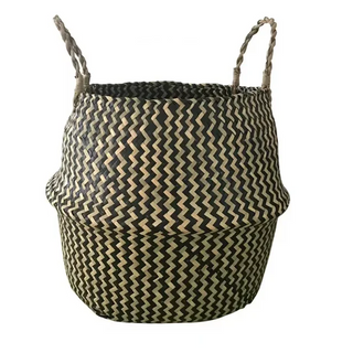 Handwoven natural and black seagrass storage basket with handles, perfect as a stylish hanging basket, pot planter, or decorative storage solution. This eco-friendly, two-tone basket adds a touch of natural boho touch while keeping your space organized. Shop handcrafted storage baskets at our natural homeware store.