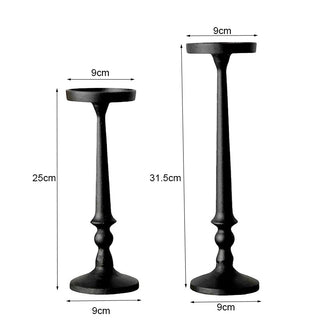 Nordic-inspired black iron candle holders for minimalist home décor.