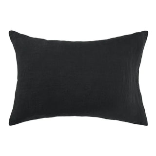 Black pure linen standard pillowcases with envelope closure, available from Arkaim Home in a variety of sizes and soft, pastel colours. Perfect for styling a relaxed, all-season bedroom look