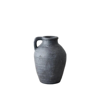 Black terracotta jug with rustic matte texture and loop handle.