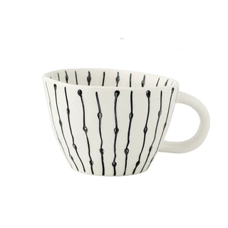 Hand-painted ceramic mug with a black and white geometric linear pattern and an irregular shape, Arkaim Home 