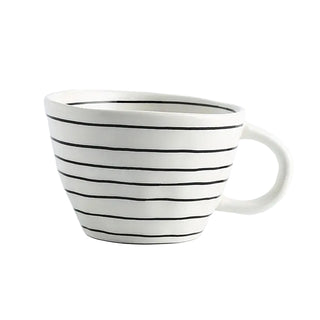 Hand-painted ceramic mug with a black and white striped pattern and an irregular shape, Arkaim Home 