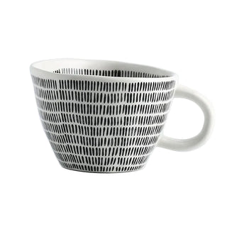 Hand-painted ceramic mug with a black and white geometric pattern and an irregular shape, Arkaim Home