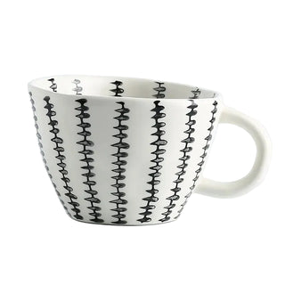 Hand-painted ceramic mug with a black and white geometric pattern and an irregular shape, Arkaim Home