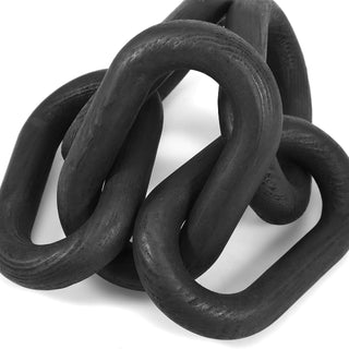 Black wooden chain link display ornament – a decorative home accessory crafted from natural wood. Perfect for modern, rustic, boho or scandi-style decor, this hand-carved wooden chain adds a stylish touch to coffee tables, shelves, or mantels. Ideal for those seeking elegant, natural home decor pieces.