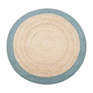 Handmade round jute rug with a natural centre and blue border, crafted in India—adds texture and timeless style to Scandi, coastal, or boho-inspired interiors.