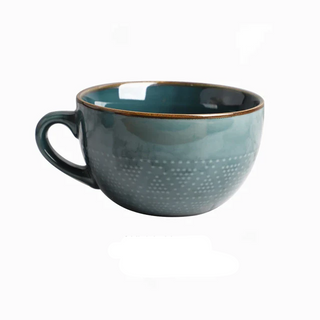 Large hand-painted blue ceramic mug with dotted pattern, glossy finish, and vibrant colour, ideal for hot drinks, soup, or cereal.