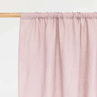 Blush pink linen rod pocket curtain panel — natural window treatment with soft drape and textured finish. 