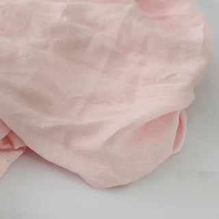 Blush pink linen curtain panel — natural window treatment with soft drape and textured finish. 