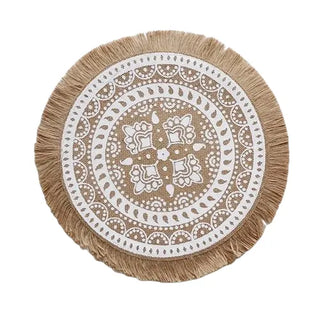 Set of four hessian boho placemats featuring a natural fibre weave and mandala design, perfect for rustic or coastal table settings.