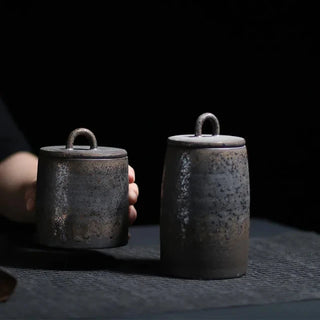 Bronze Japanese stoneware storage jar with lid, featuring a rustic finish. Perfect for kitchen organization, this ceramic canister provides airtight storage for tea, coffee, spices, or pantry essentials. A stylish and functional addition to natural homeware and minimalist décor.