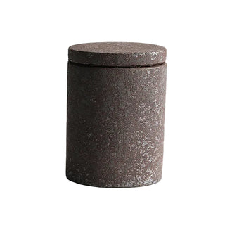 Dark brown ceramic kitchen storage canister with lid, minimalist design.