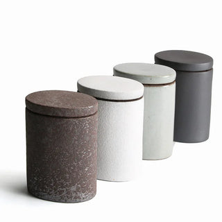 Modern ceramic kitchen canisters for organised open shelving.