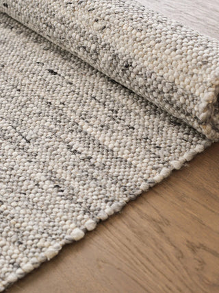 anvi-handmade-wool-and-linen-rug-charcoal-and beige-rug-hand-woven-natural-fibers-carpet-contemporary-scandi-coastal-boho-wabi-sabi-home-decor
