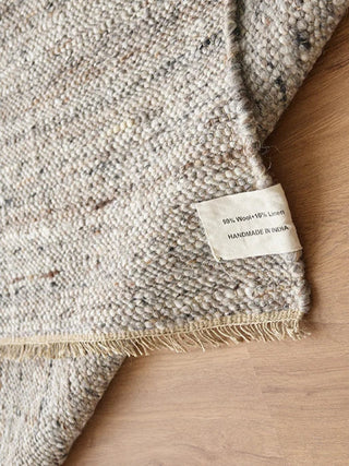 anvi-handmade-wool-and-linen-rug-charcoal-and beige-rug-hand-woven-natural-fibers-carpet-contemporary-scandi-coastal-boho-wabi-sabi-home-decor