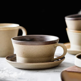 Handmade Japanese ceramic stoneware Miri Coffee Set with a glazed swirl speckled cup and saucer. Perfect for milk, tea, or coffee.