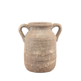 Rustic pottery vase with textured surface and double handles.