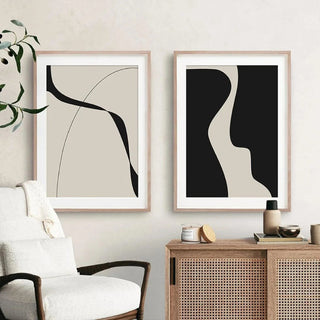Set of 2 contemporary abstract canvas prints with elegant and bold design, featuring subtle, calming curves in a beautiful beige and black combination that would effortlessly suit any contemporary décor.