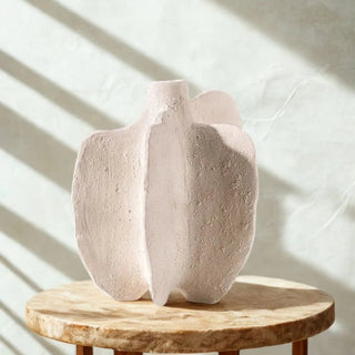 Textured marine style ceramic vase for coastal décor.