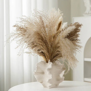 Pontus sculptural ceramic vase with matte finish, featuring organic coral-inspired shape in neutral tones—perfect for minimalist and coastal interiors.