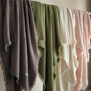 Minimalist cotton muslin throws for bed or sofa styling
